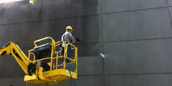 Commercial pressure washing from a boom lift